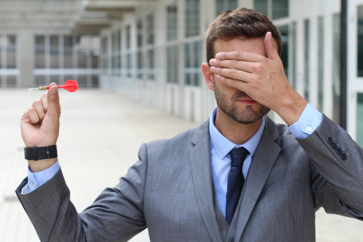 covering eyes shooting dart